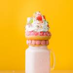 Close-Up Photo Of Dessert On Top Of The Jar